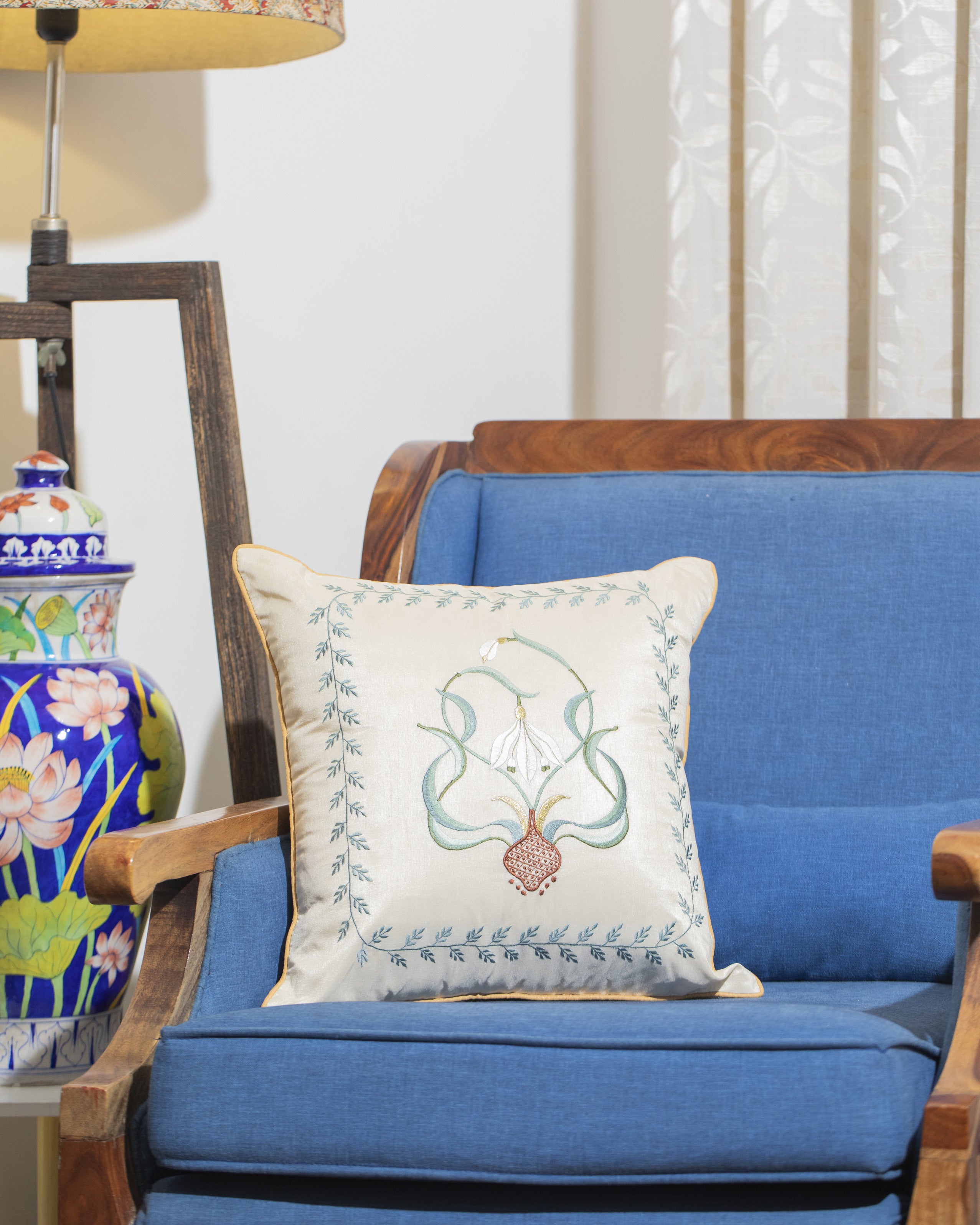 Serene Sojourn: A Hand-Embroidered Silk Cushion