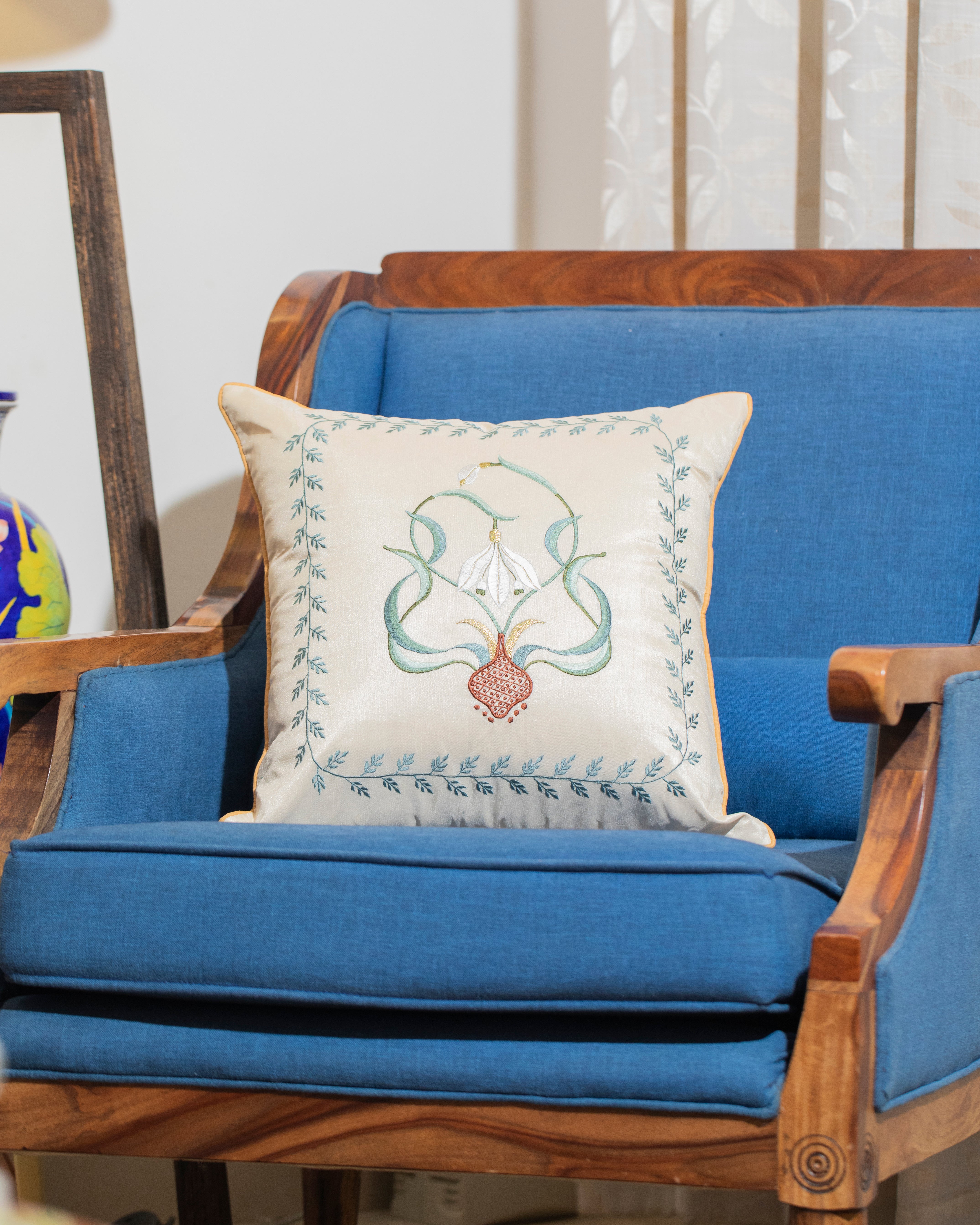 Serene Sojourn: A Hand-Embroidered Silk Cushion
