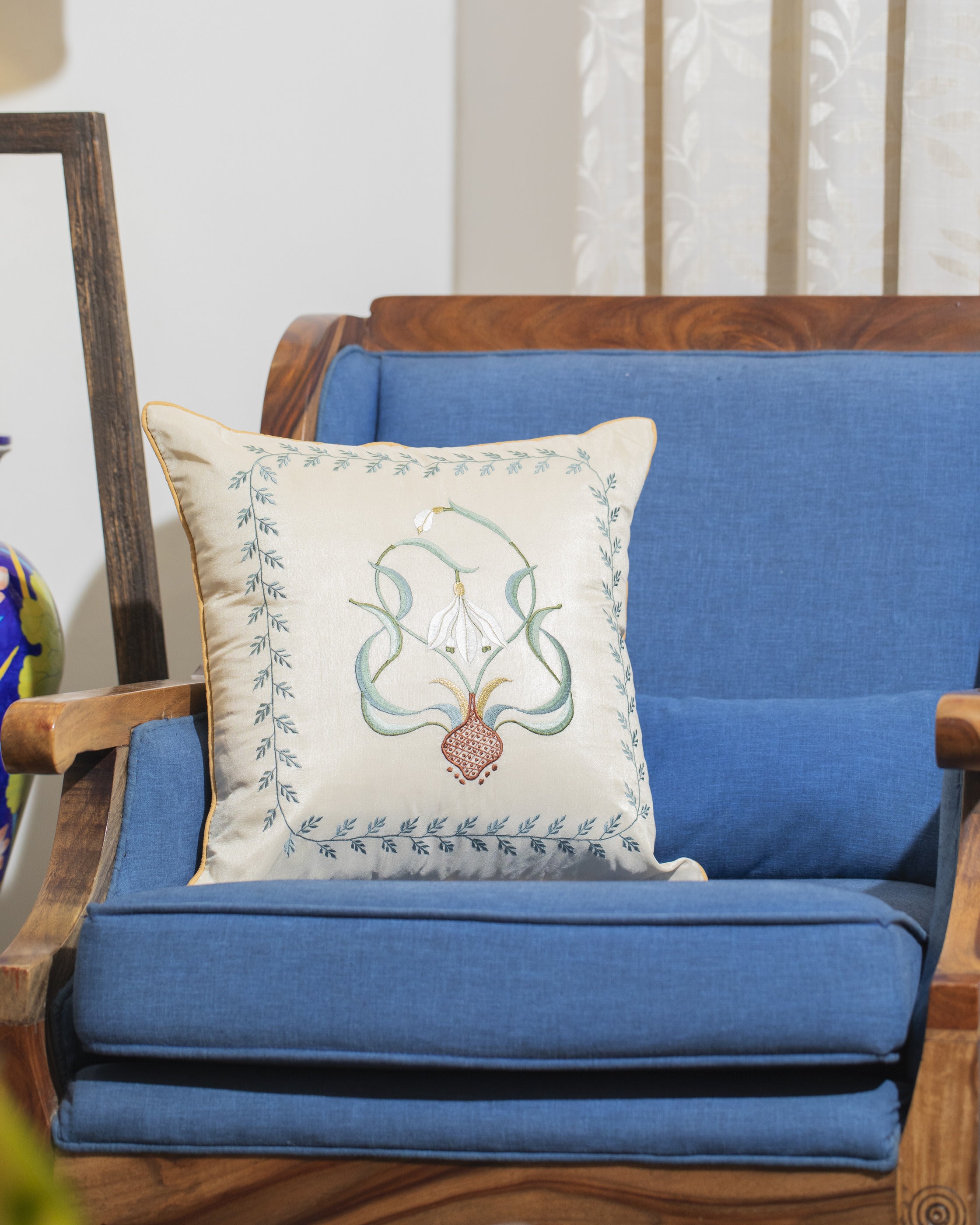 Serene Sojourn: A Hand-Embroidered Silk Cushion